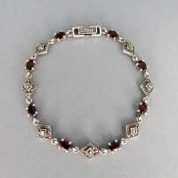 Elegant link bracelet in sterling silver with garnets and marcasites 