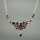 Elegant collier necklace in sterling silver with deep red bohemian garnets