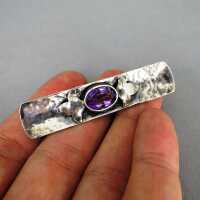 Modernist 800 silver hammered brooch with violet amethyst cabochon