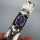 Modernist 800 silver hammered brooch with violet amethyst cabochon