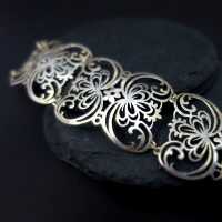 Heavy open worked  link bracelet with abstract-floral design Art Deco