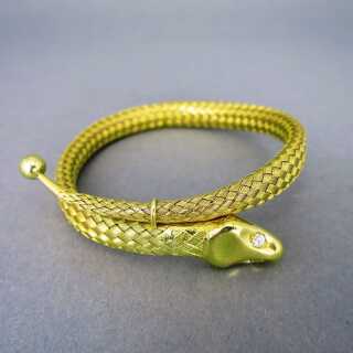 Exklusiver Schlangen Armreif in 750/-Gold geflochten mit Brillant-Augen