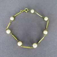 Delicate woman link bracelet with real pearls and 14 k gold bars