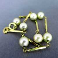 Delicate woman link bracelet with real pearls and 14 k gold bars