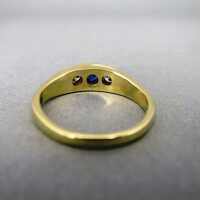 Massive 14 k gold woman band ring with blue sapphire and two diamonds 