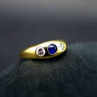 Massive 14 k gold woman band ring with blue sapphire and two diamonds 