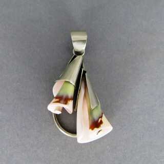Unique designer pendant with shell and sterling silver mounting