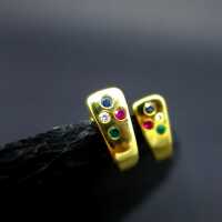 18 k gold stud earrings with diamond ruby emerald and sapphire precious stones