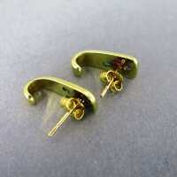 18 k gold stud earrings with diamond ruby emerald and sapphire precious stones