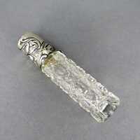 Antique perfume bottle in crystal glass and silver...