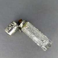 Antique perfume bottle in crystal glass and silver...