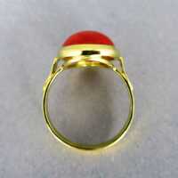 18 k gold ladys ring with a huge red mediterranean coral cabochon from Italy