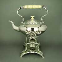Elegant antique victorian tilting tea pot silver plated with ivory handles 1869