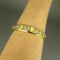 Beautiful womans bangle in 14 k gold with high quality diamonds