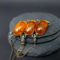 Silver and amber handmade retro woman brooch from the Sowiet Union about 1960