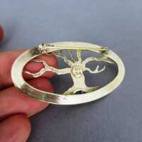 Open worked brooch in silver with moonstone with mythical tree Yggdrasil 