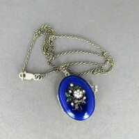 Charming sterling silver medallion pendant with blue enamel and pearls