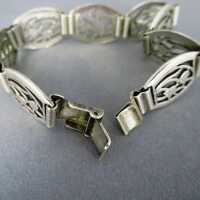 Silver Art Deco open worked link bracelet with floral bellflower decor
