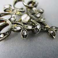 Magnificent brooch in 750 gold and silver with diamond roses