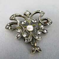 Precious18 k gold and silver brooch with rose cut...