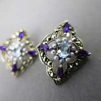 Charming stud earrings in sterling silver with blue topazes, amethyste and pearls