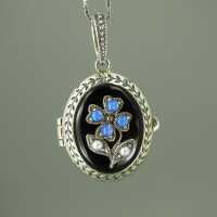 Charming sterling silver medallion pendant with black...