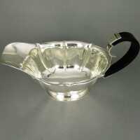 Elegant shaped Art Deco sauce boat in silver and ebony by...