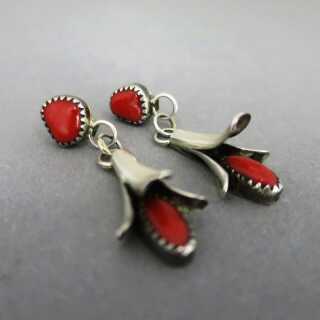 Zuni native jewelry floral stud earrings in silver with red coral cabochons