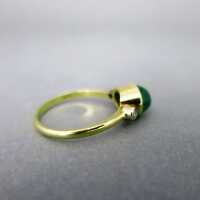 Beautiful ladys gold ring with huge emerald cabochon and two diamonds