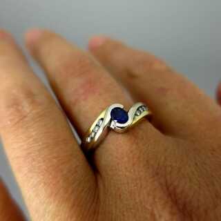 Ladys two tone 18 k white and yellow gold ring with sapphire and diamonds