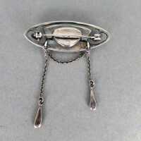 Elegant Jugendstil sterling silver brooch with red garnet and lavaliere pendant