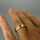 Schöner vintage Damen Band Ring im Verlauf mit einem Rubin und zwei Brillanten
