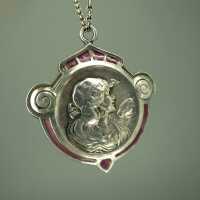Antique Jugendstil massive silver pendant with red-violet enamel and woman