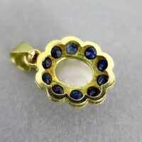 Charming gold pendant with genuine white opal cabochon and deep blue sapphire