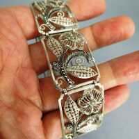 Heavy open worked filigree Art Deco silver link bracelet with floral decor