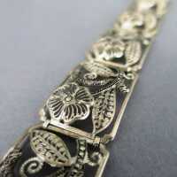 Heavy open worked filigree Art Deco silver link bracelet with floral decor