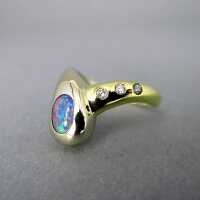 Beautiful 18 k gold ladys ring with fiery opal and three small diamonds