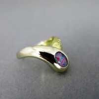 Beautiful 18 k gold ladys ring with fiery opal and three small diamonds