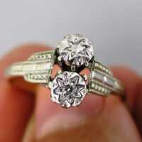 Gorgeous Art deco gold and platinum engagement ring with two sparkly diamonds