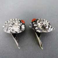 Unique shell-shaped handmade cufflinks in silver with red coral cabochons