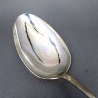 Huge antique serving spoon in silver decorated with an amber cabochon