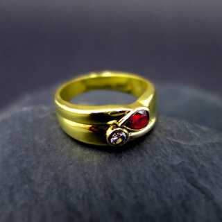 Elegant two tone 18 k gold ladys band ring with ruby drop and a sparkly diamond 