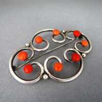 Huge heavy open worked silver brooch with red coral...