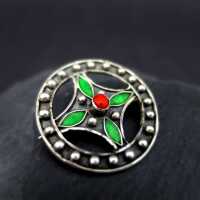 Round open worked silver brooch with red coral and green enamel France