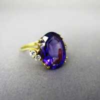 Sparkly ladys gold ring with huge deep violet amethyst...