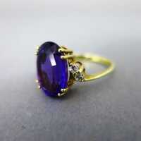 Sparkly ladys gold ring with huge deep violet amethyst...