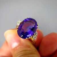 Sparkly ladys gold ring with huge deep violet amethyst and four diamonds