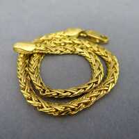 Elegant 18 k yellow gold ladys bracelet with woven design