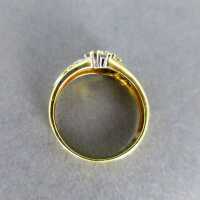 Beautiful ladys band gold ring with many sparkly diamonds