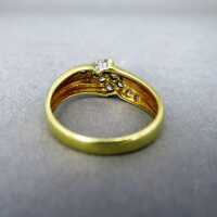 Beautiful ladys band gold ring with many sparkly diamonds